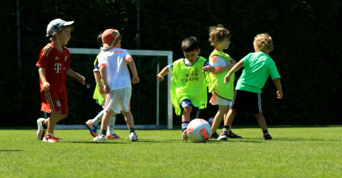 The youngest soccer players only know way - after the ball